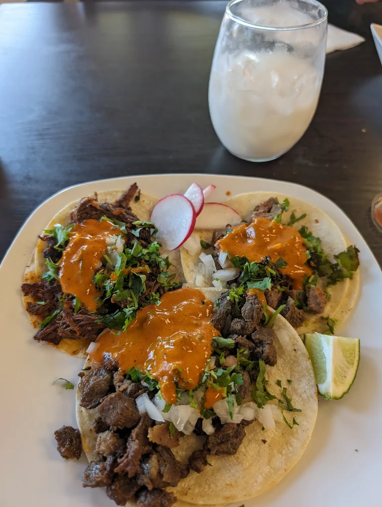 Tacos De Barbacoa - Slow-cooked beef tacos.