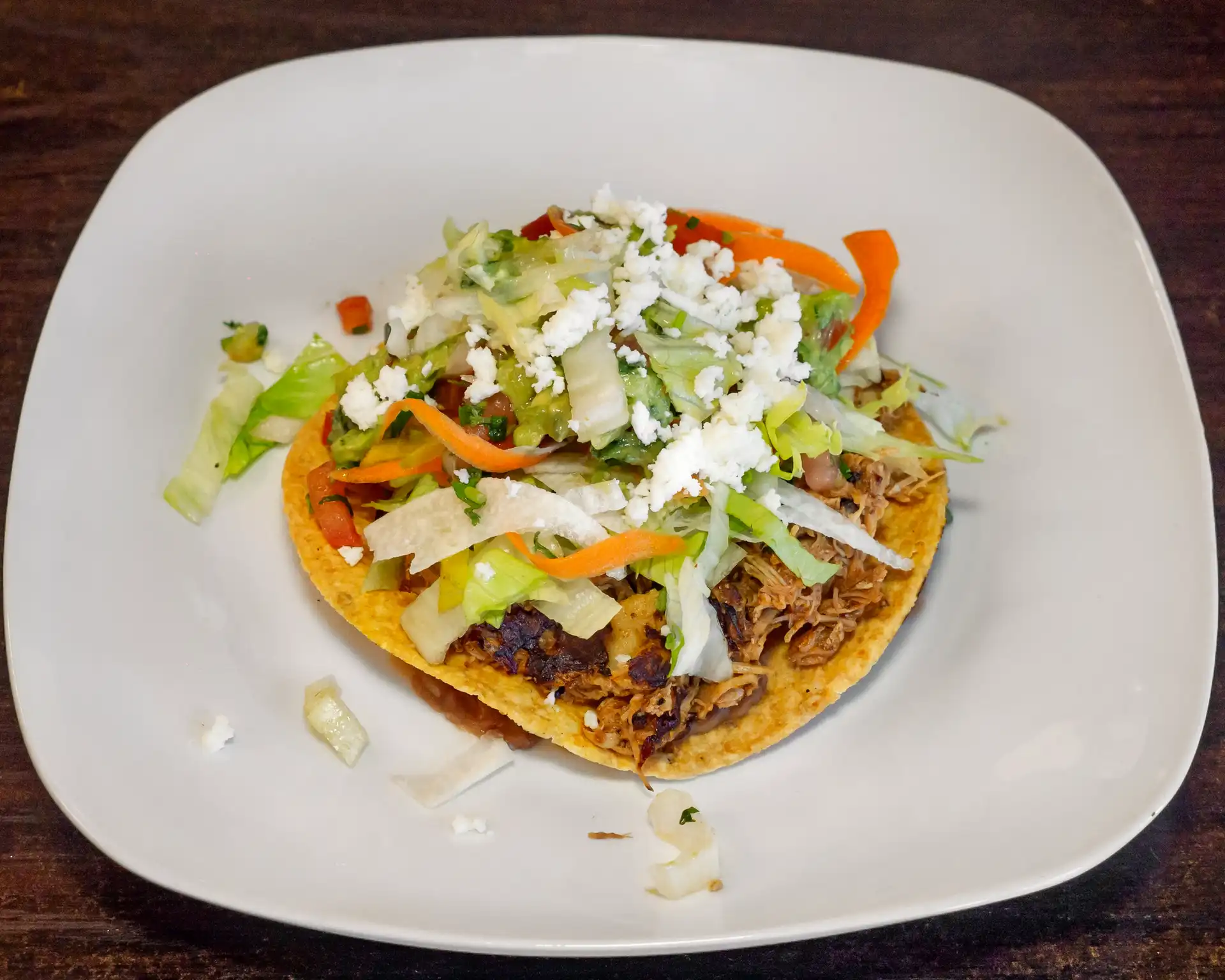Tostadas - Crispy tortillas with toppings.